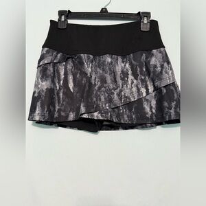 Fila Women's Essentials Tiered Ruffle Tennis Skort in a black and grey print